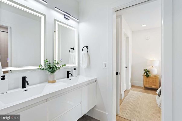 Bathroom, Dual Sink Vanities, Interior, Recessed Lighting, Wood Texture Flooring