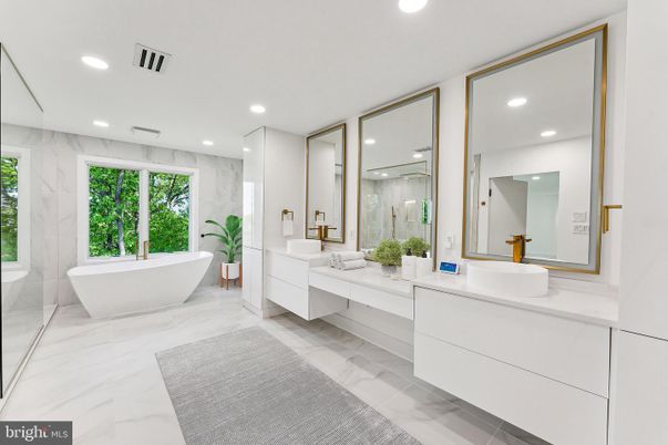 Bathroom, Dual Sink Vanities, Free Standing Baths, Glass Shower, Interior, Marble, Marble Walls, Recessed Lighting