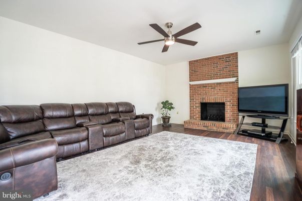 Home Theatre Room, Fireplace, Interior, Living room, Stone Walls, Wood Texture Flooring