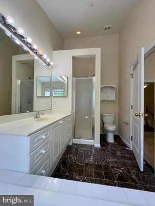 Bathroom, Dual Sink Vanities, Glass Shower, Interior, Marble, Recessed Lighting