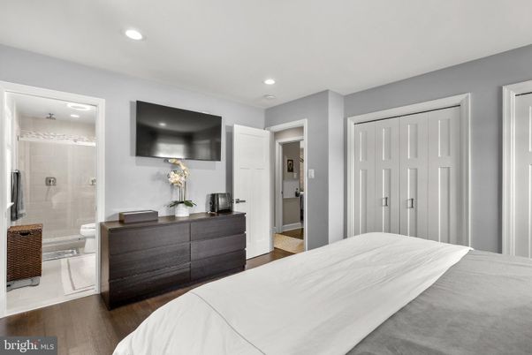 Bathroom, Bedroom, Glass Shower, Interior, Recessed Lighting, Wood Texture Flooring