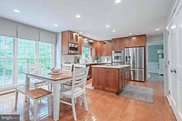 Dining room, Interior, Kitchen, Recessed Lighting, Stainless Steel Appliances, Wood Texture Flooring