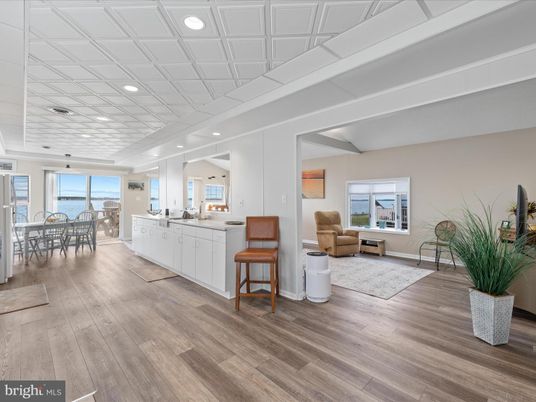 Dining room, Interior, Kitchen, Living room, Recessed Lighting, Water, Wood Texture Flooring
