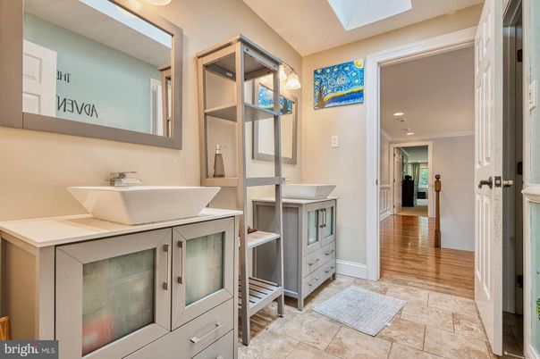 Bathroom, Dual Sink Vanities, Interior, Recessed Lighting, Wood Texture Flooring