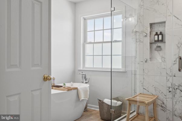 Bathroom, Free Standing Baths, Glass Shower, Interior, Marble Walls, Wood Texture Flooring