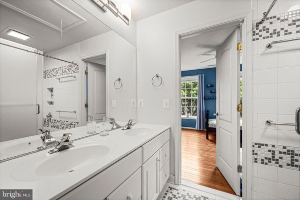 Bathroom, Dual Sink Vanities, Glass Shower, Interior, Wood Texture Flooring