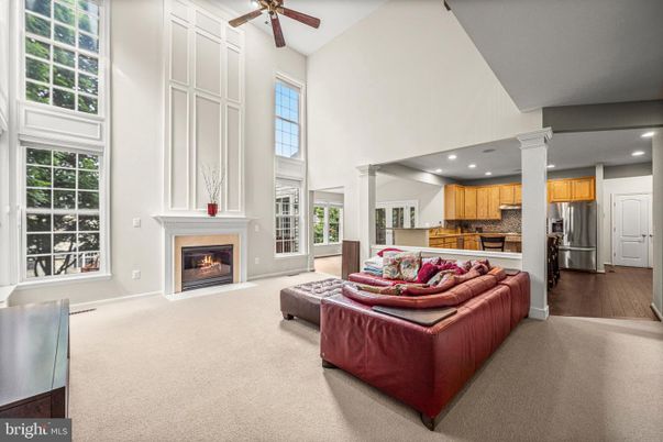 Fireplace, Interior, Kitchen, Living room, Recessed Lighting, Stainless Steel Appliances, Wood Texture Flooring