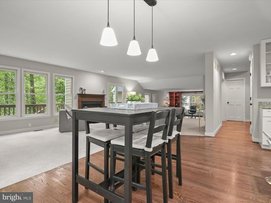 Dining room, Fireplace, Interior, Pendant Lights, Recessed Lighting, Wood Texture Flooring