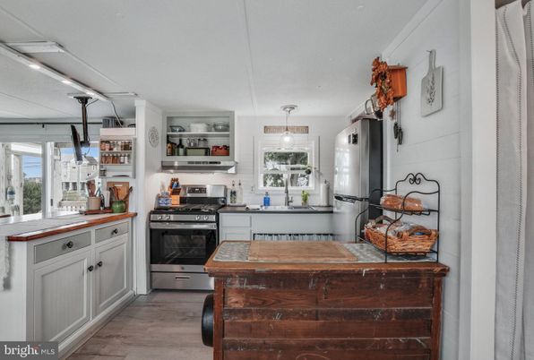 Interior, Kitchen, Pendant Lights, Stainless Steel Appliances, Wood Texture Flooring