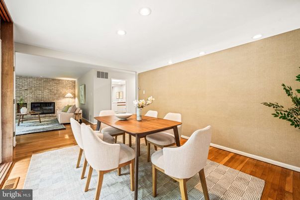 Dining room, Fireplace, Interior, Recessed Lighting, Stone Walls, Wood Texture Flooring