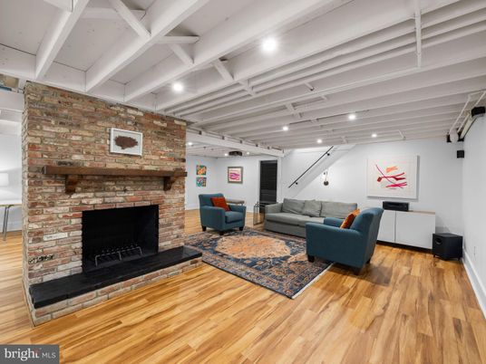 Fireplace, Interior, Living room, Recessed Lighting, Stone Walls, Wood Texture Flooring