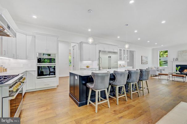 Fireplace, Interior, Kitchen, Pendant Lights, Recessed Lighting, Stainless Steel Appliances, Wood Texture Flooring