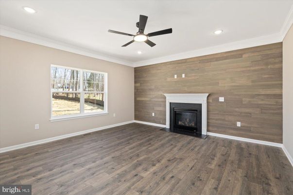 Empty room, Fireplace, Interior, Recessed Lighting, Wood Texture Flooring, Wooden Walls