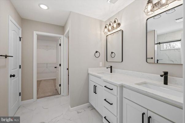 Bathroom, Dual Sink Vanities, Interior, Marble, Marble Walls, Recessed Lighting