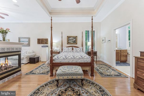 Bedroom, Fireplace, Interior, Recessed Lighting, Wood Texture Flooring