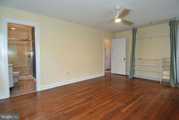 Bathroom, Empty room, Glass Shower, Interior, Recessed Lighting, Wood Texture Flooring