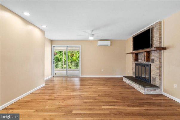 Empty room, Fireplace, Interior, Recessed Lighting, Wood Texture Flooring