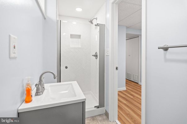 Bathroom, Glass Shower, Interior, Recessed Lighting, Wood Texture Flooring