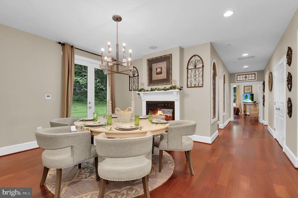 Dining room, Fireplace, Interior, Pendant Lights, Recessed Lighting, Wood Texture Flooring