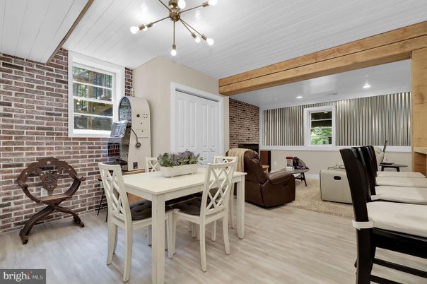Dining room, Interior, Living room, Pendant Lights, Recessed Lighting, Stone Walls, Wooden Beams, Wood Texture Flooring