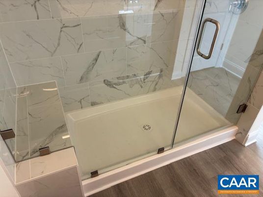 Bathroom, Glass Shower, Interior, Marble Walls, Wood Texture Flooring