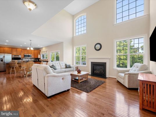 Dining room, Fireplace, Interior, Kitchen, Living room, Pendant Lights, Recessed Lighting, Stainless Steel Appliances, Wood Texture Flooring
