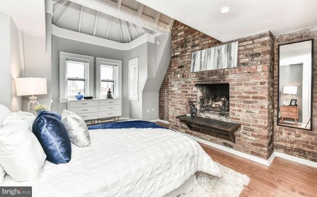 Bedroom, Fireplace, Interior, Recessed Lighting, Stone Walls, Wood Texture Flooring