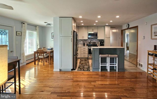 Dining room, Interior, Kitchen, Recessed Lighting, Stainless Steel Appliances, Wood Texture Flooring