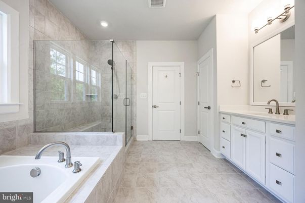 Bathroom, Dual Sink Vanities, Glass Shower, Interior, Marble, Marble Walls, Recessed Lighting