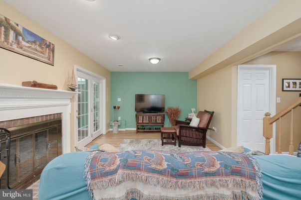 Bedroom, Fireplace, Interior, Recessed Lighting, Wood Texture Flooring