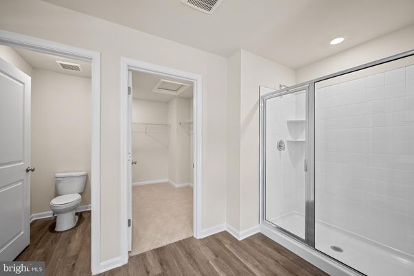 Bathroom, Glass Shower, Interior, Recessed Lighting, Walk-in Closets, Wood Texture Flooring