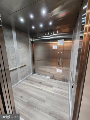 Elevator, Interior, Recessed Lighting, Wood Texture Flooring