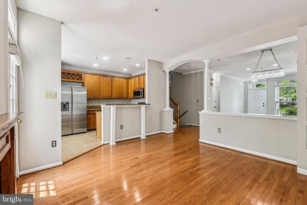 Chandelier, Interior, Kitchen, Pendant Lights, Recessed Lighting, Stainless Steel Appliances, Wood Texture Flooring
