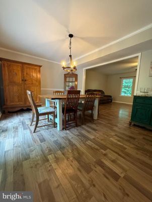 Chandelier, Dining room, Interior, Wood Texture Flooring