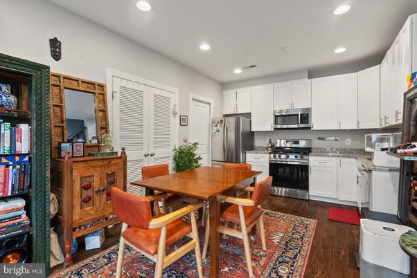 Dining room, Interior, Kitchen, Recessed Lighting, Stainless Steel Appliances, Wood Texture Flooring