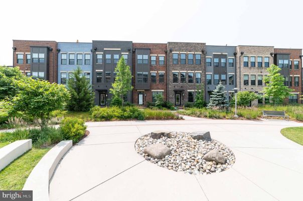 Exterior, Facade, Brick Facade, Condo Building