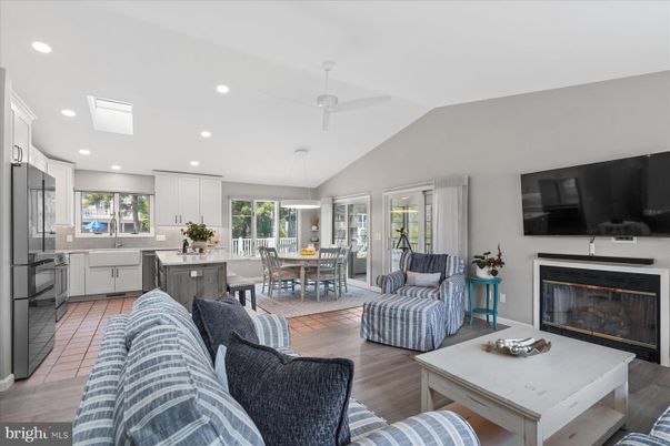 Dining room, Fireplace, Interior, Kitchen, Living room, Recessed Lighting, Wood Texture Flooring