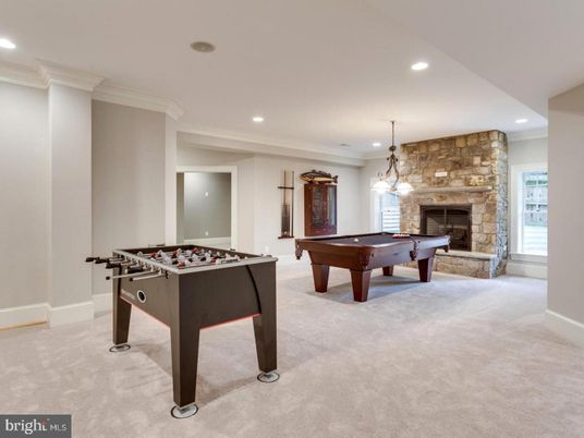 Billiard Table, Chandelier, Fireplace, Game Room, Interior, Pendant Lights, Recessed Lighting, Stone Walls