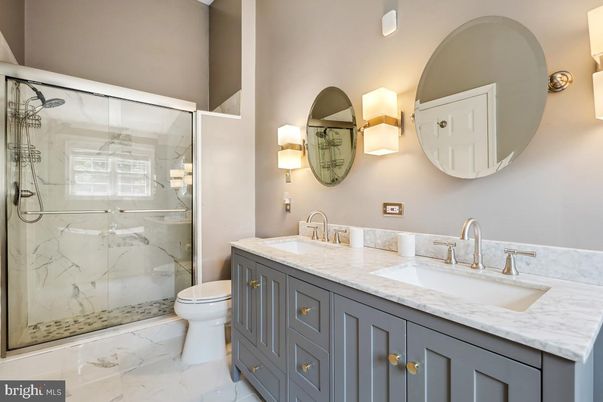 Bathroom, Dual Sink Vanities, Glass Shower, Interior, Marble, Marble Walls