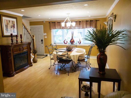 Dining room, Fireplace, Interior, Pendant Lights, Recessed Lighting, Wood Texture Flooring
