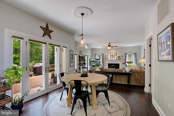 Dining room, Fireplace, Interior, Pendant Lights, Wood Texture Flooring