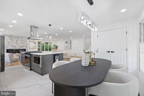 Fireplace, Interior, Kitchen, Living room, Marble, Pendant Lights, Recessed Lighting, Stainless Steel Appliances