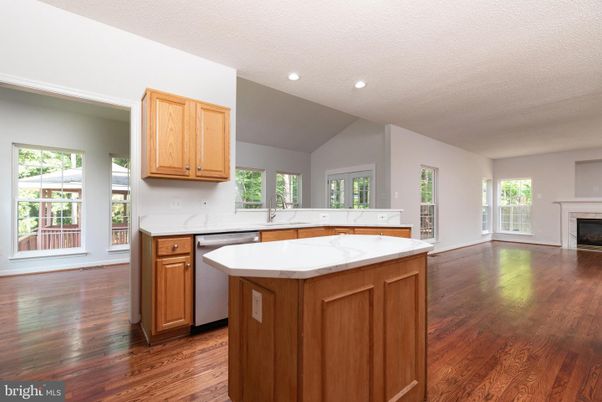 Fireplace, Interior, Kitchen, Recessed Lighting, Wood Texture Flooring