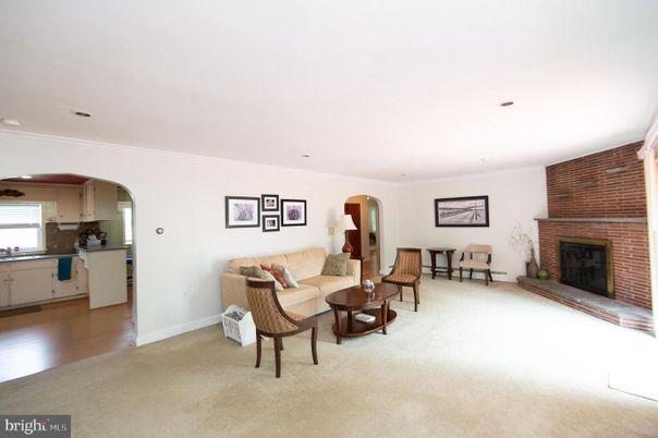 Fireplace, Interior, Kitchen, Living room, Recessed Lighting, Stone Walls, Wood Texture Flooring