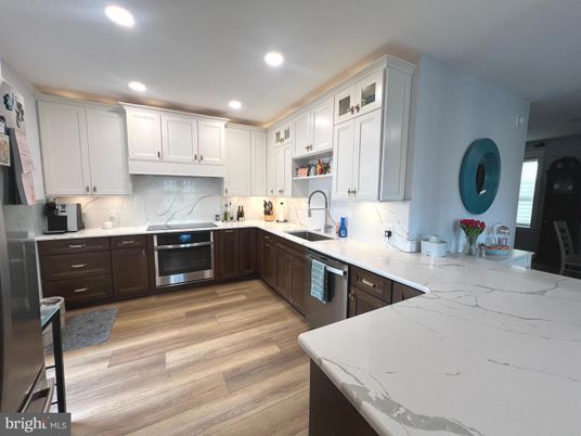 Interior, Kitchen, Recessed Lighting, Stainless Steel Appliances, Wood Texture Flooring