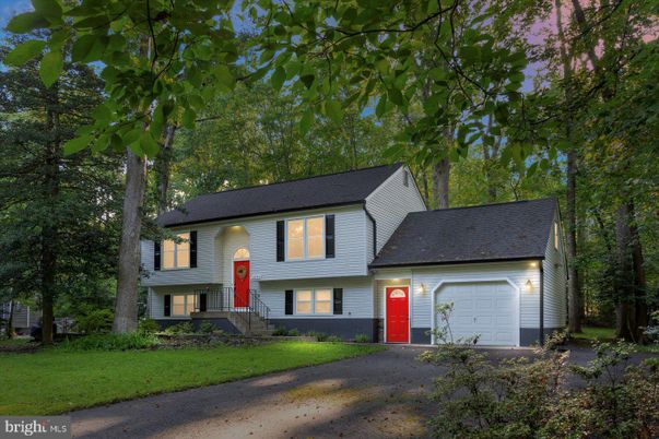 Attached, Exterior, Facade, Raised Ranch