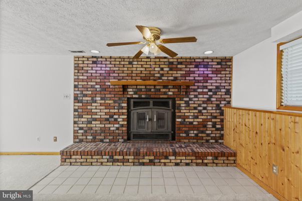 Empty room, Fireplace, Interior, Recessed Lighting, Stone Walls