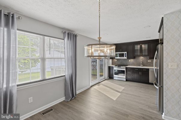 Interior, Kitchen, Pendant Lights, Stainless Steel Appliances, Wood Texture Flooring
