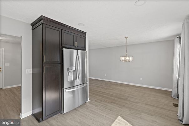 Interior, Kitchen, Pendant Lights, Stainless Steel Appliances, Wood Texture Flooring