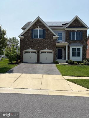 Attached, Exterior, Facade, Solar Panels, Brick Traditional